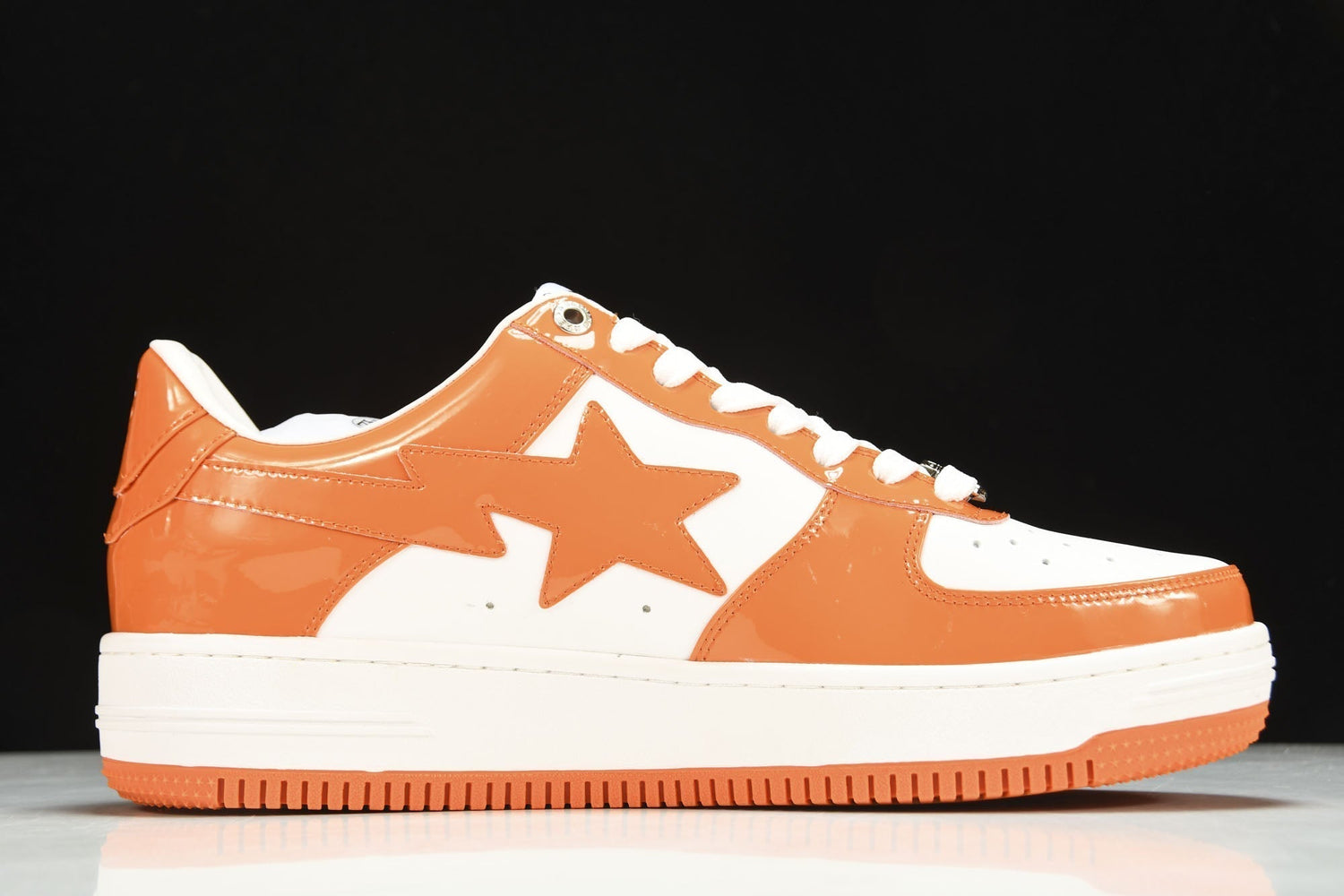 Vibrant BAPE STA Low Orange Leather Sneakers for Iconic Streetwear Style